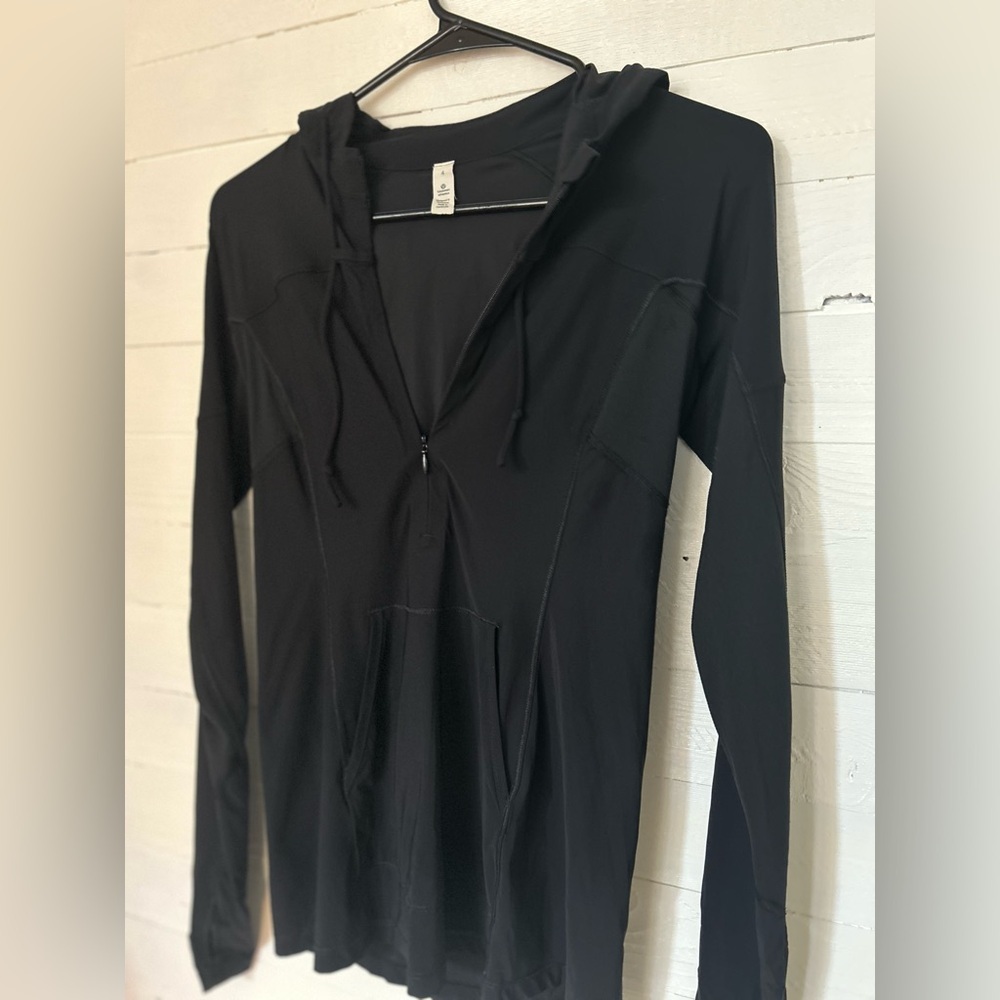 Lululemon Black pullover jacket, black, 1/4 zip. Women’s size 4.